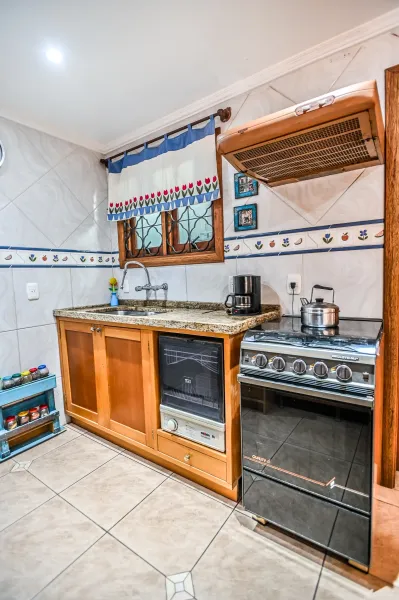Casa em condomínio no Guarujá, Porto Alegre - Imobiliária - foto 17